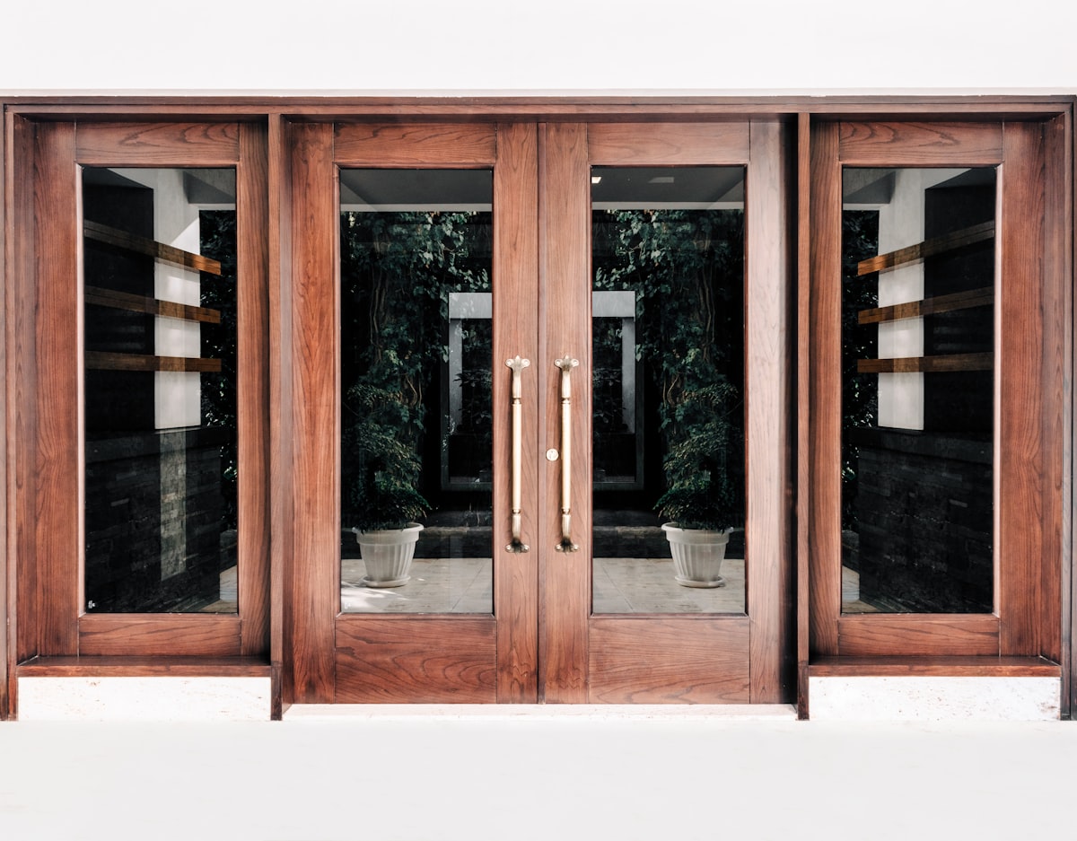 Wooden door gate. related to Enhancing Your Home's First Impression with Entryway Doors with Sidelights