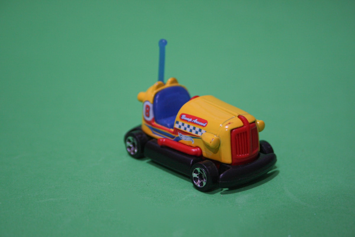 yellow and blue truck toy related to Exploring the Fisher-Price Car Bed