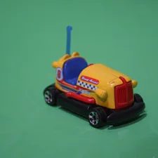 yellow and blue truck toy related to Exploring the Fisher-Price Car Bed